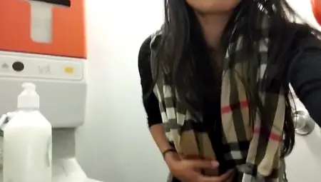 Asian Pussy Gets Wet On Airplane Toilet