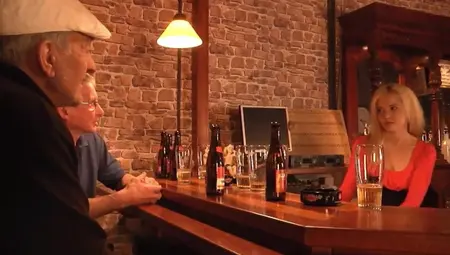 Two Tourist Oldmen Fuck American Blonde In A Bar