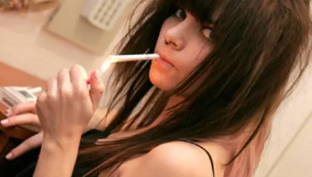 Teen Girl Smokes While Stripping