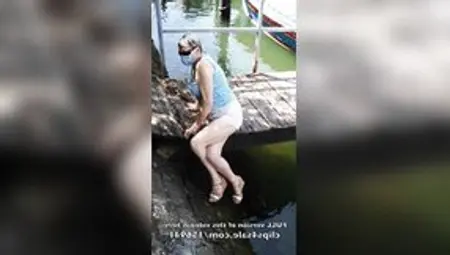 Outdoor Public Crossed Legs Orgasm Near A River With Boats Passing By