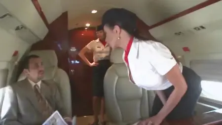 Beautiful Stewardess Is Fucking With Two Businessmen On The Board Of A Plane
