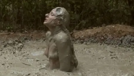 Naughty Amateur Brunette Babe Enjoys The Mud