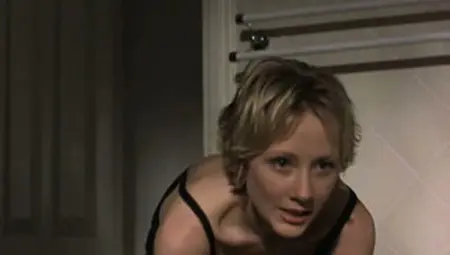 Anne Heche Wearing A Slightly See-through Tanktop With No