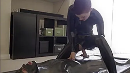 Man In Latex Vacbed Fucked