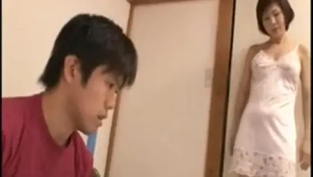 Alluring Japanese MILF Seduces Shy Virgin Youngster
