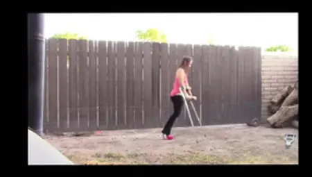 Amputee Brittney Using High Heel And Crutch