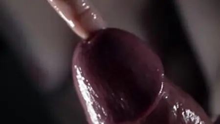 Close - Up Slow-motion Jerking Off The Urethra With A Finger And Sucking A Large Jock To Cum
