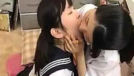 Two Asian Lesbian Schoolgirls Make Out Before They Go For P