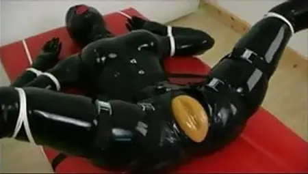 Rubber Doll In Bondage - Vibed And Fingered