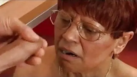 Granny In Glasses Satisfies A Cock