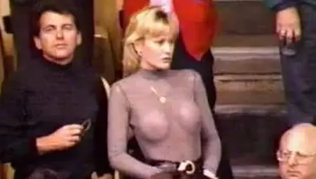 MILF With See Through Top At Sporting Event