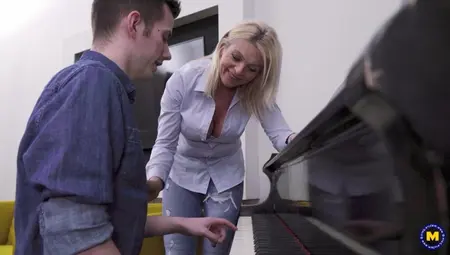 Blonde Piano Teacher Keeps The Young Man Motivated Using Sexual Rewards