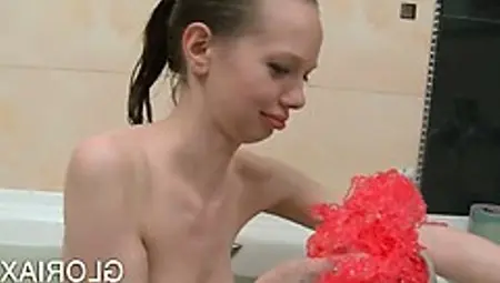 Skinny Gloria Washing Shaved Pussy In Bathtub