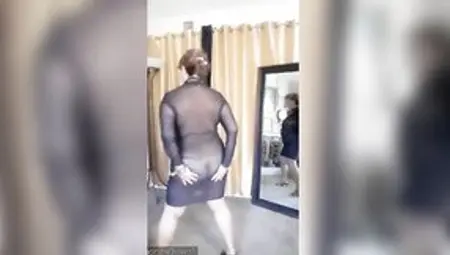 Dancing Nude Into A Transparent Dress. Older 67 Year Woman