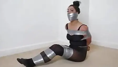 Girl In Pantyhose Duct Tape Wrap Gagged In Bondage