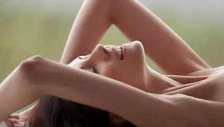 Sade Mare Teasing Nude In The Window In Erotic Video By Femjoy