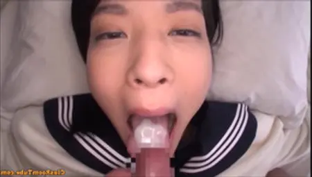Japanese Schoolgirl Abe Mikako Blowing And Taking A Jizz In Her Mouth