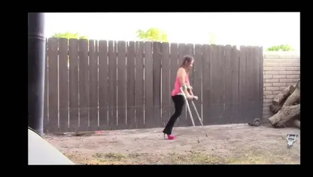 Amputee Brittney Using High Heel And Crutch