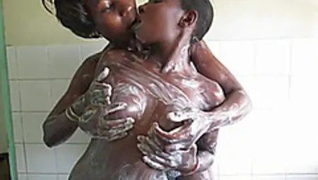 Soapy African Lesbians Cuddling In The Shower While Washing.