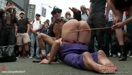 Busty Slave Caned On The Street