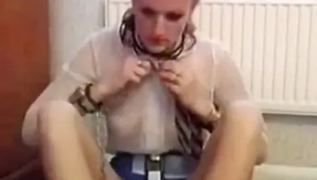 Girl Putting On Chastity Belt And Steel Shackles