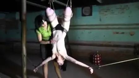 Delightful Lesbian Slave Gets Caged, Tied Up And Suspended