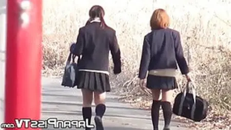 Kinky Schoolgirls From Japan Hold Each Other And Pee Outside
