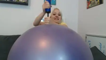 Hilarious Blonde Nympho With Big Boobies Was Playing With Inflatable Toy
