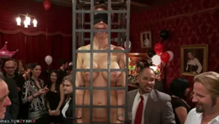 Slaves Are Caged And Toyed At Party