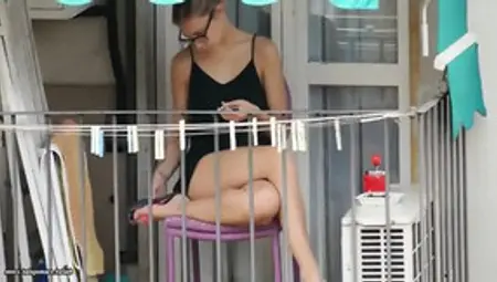 Teen Neighbor Shows Upskirt On The Balcony II