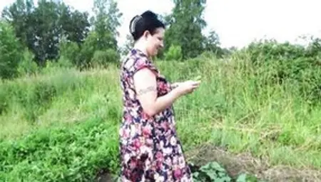 Big Boobed MILF Masturbates With Cucumber And Strawberries Outdoor Into A Outside Place