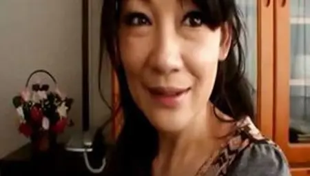 Asian MILF Shows Her Ass And Sucks And Gets Fucked Doggy Style