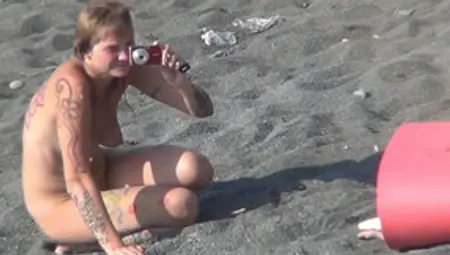 MILF Nudist Is Getting Naked On The Beach