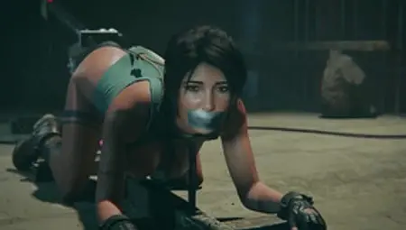 Enslaved Lara Croft Enjoys Pussy-Toying With Sex-Machine