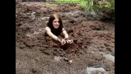 Fetish With A Young Amateur Brunette Girl Stuck In Mud