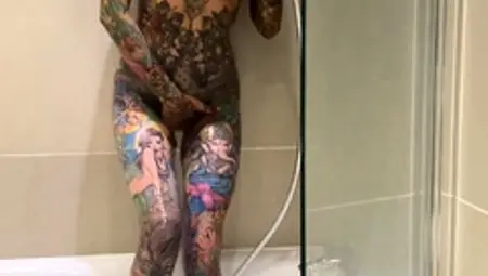 Tattooed Beauty Indulges In Hot Masturbation In The Shower
