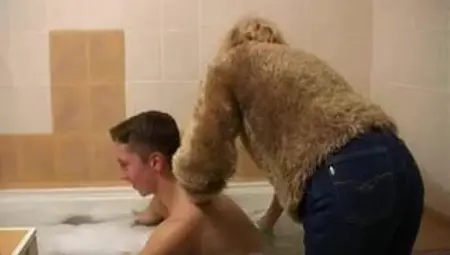 Older Woman Gives Young Man Bath