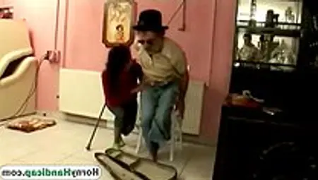 Brunette Babe Seduces Handicapped Grandpa With Blowjob