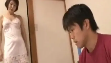 Alluring Japanese MILF Seduces Shy Virgin Youngster