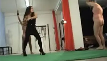 Italian Mistress Whipping Two Slaves