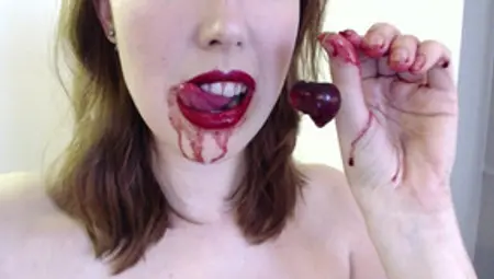 Redhead Eating Fruit Seductively Dripping On Tits And Bush