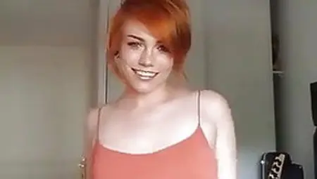 Sexy Redhead Dances And Strips