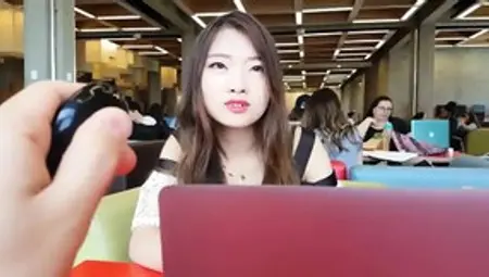Cute Asian Girl With Remote Vibe Outside