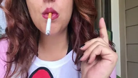 Sexy Brunette Babe Smoking 100 W Pink Lipstick And Fuzzy Hello Kitty Shirt