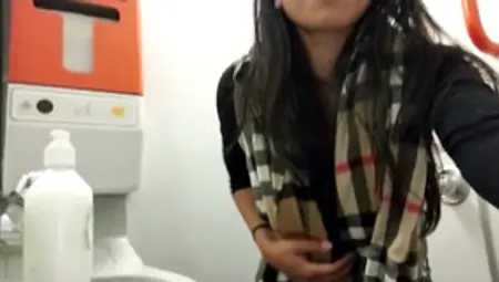 Asian Pussy Gets Wet On Airplane Toilet
