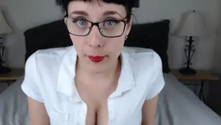 Female With Glasses And Bright Lipstick Tempts Fans Flashing Boobs