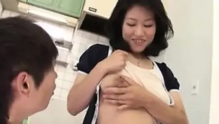 Japanese MILF Squirting Out Some Milk