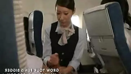 Japanese Stewardess Gives A Passenger A Handjob During The Flight