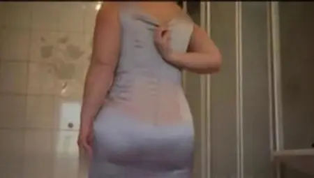 Chubby Older Chick Stripping Her Dress In The Bathroom Slowly