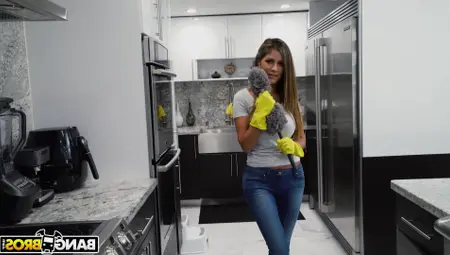 Busty Woman Stops Cleaning Around The House To Pose Nude